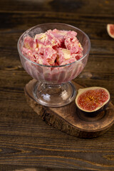 creamy sweet ice cream and sliced red fig fruits