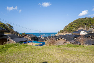Japanese village by the sea in Asia, Japan, Kansai, Kinosaki, in summer, on a sunny day.