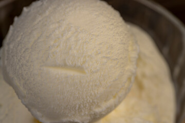 creamy balls of fresh white ice cream in a glass