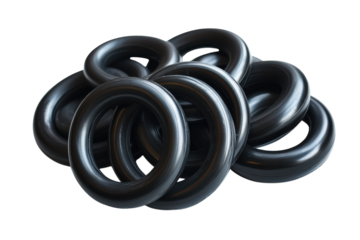 A creative arrangement of black rubber rings set against a simple white background isolated on transparent background
