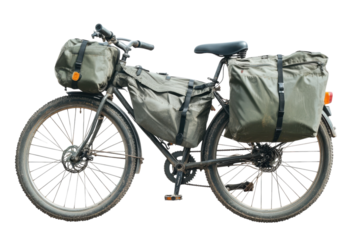 Exploring rugged terrain with a well-equipped bicycle and sturdy bags in the outdoors isolated on transparent background