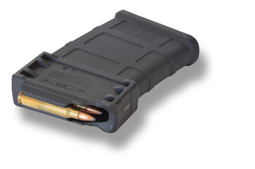Dropshadow below a polymer gun magazine for 5.56 caliber isolated in a transparent png