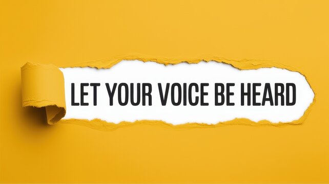 Torn paper revealing the phrase let your voice be heard