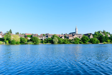 Obraz premium Dampierre-en-Burly view from the pond in Europe, France, Centre Val de Loire, Loiret, Dampierre en Burly, in summer, on a sunny day.