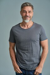 Portrait of happy casual older bearded man with gray hair smiling, Mid adult, mature age guy...