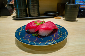Tuna sushi in Osaka in Asia, Japan, Kansai, Osaka, in summer, on a sunny day.