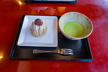 Mont Blanc pastry and matcha green tea in Asia, Japan, Kansai, Ise, in summer, on a sunny day.
