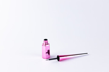 Elegant Pink Cosmetic Bottle and Applicator for Eye Makeup, Showcasing a Stylish Design Perfect for...