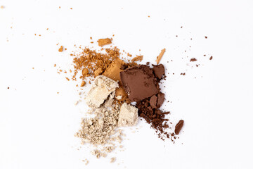 A Colorful Array of Various Natural Spices and Powders Displayed on a White Surface, Showcasing Rich Earth Tones and Diverse Textures for Culinary Inspiration