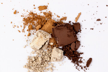 A Colorful Display of Various Natural Powders Laid Out on a White Surface Perfect for Culinary and Cosmetic Use in Unique Recipes and Formulations
