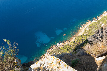 The Mediterranean Sea and rocks in Europe, France, Provence Alpes Cote d Azur, Bouches du Rhone, La Ciotat, in summer, on a sunny day.