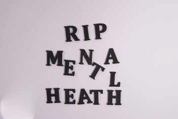 RIP Mental Health Black wooden latter, white background, Moving forward, self-love, counseling, patient, positive thoughts 