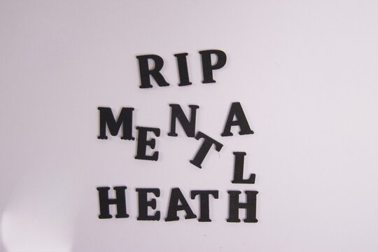 RIP Mental Health Black wooden latter, white background, Moving forward, self-love, counseling, patient, positive thoughts 