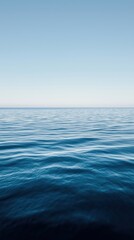 Minimalist ocean landscape with calm blue water and clear sky