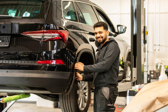 mechanic working on a car