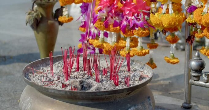 Incense sticks for worshiping Buddha images.Incense sticks for worshiping Buddha statues.Incense burner at tample in Thailand.Incense stick in the old tample.