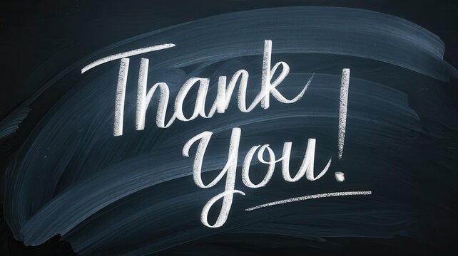 Chalkboard art displays the words thank you in elegant writing
