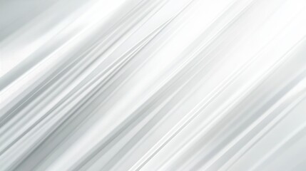Fototapeta premium A dynamic abstract background featuring flowing white and light gray lines that create a sense of movement and serenity.