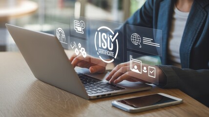 Woman using laptop with iso certificate and compliance icons