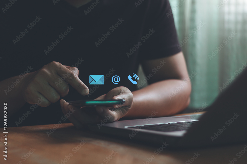 Aufkleber businessman using a smartphone for webpage business communication including email, address and phone