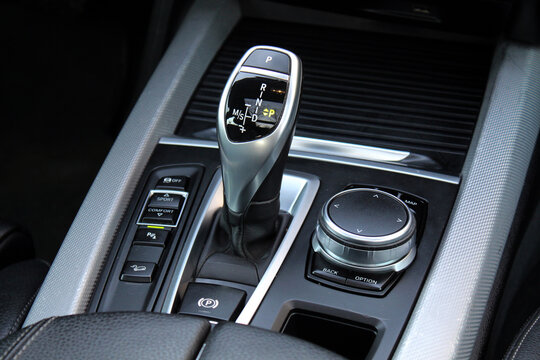 Automatic transmission gearshift stick, Closeup a manual shift of modern car gear shifter. Close up of the automatic gearbox lever, black interior car.