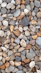 Natural assorted river stones and pebbles in earthy tones