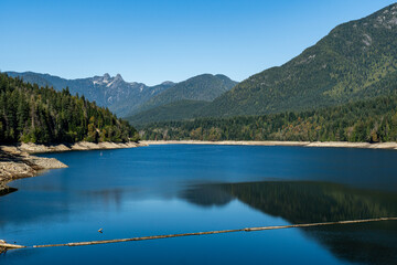 Capilano lake and mountain in Capilano River Regional Park North Vancouver British Columbia Canada