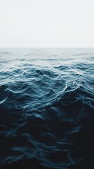 Fototapeta premium Dark ocean waves with dramatic white foam and deep blue textures