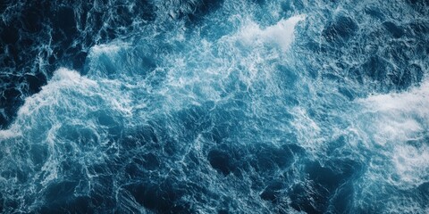 Naklejka premium Dark ocean waves with dramatic white foam and deep blue textures