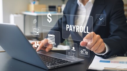 Man uses laptop with virtual payroll related icons appearing