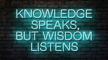 Fototapeta premium Knowledge speaks but wisdom listens glows with neon light