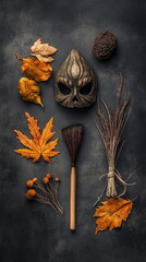 A dark Halloween composition,decoration featuring an mask, a broomstick, and autumn leaves on a dark background. Vertical footage for social media, Tik Tok, Shorts, reels.