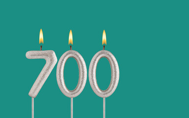 Number of followers or likes - Candle number 700.