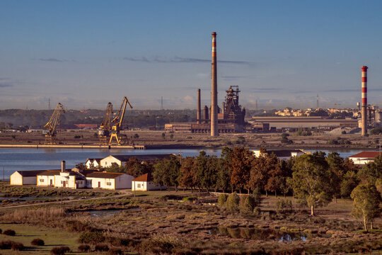 Portuguese steel industry in the town of Paio Pires seen across the Ribeira das naus. Portuguese steel industry in the town of Paio Pires seen across the river.Barreiro-Portugal.