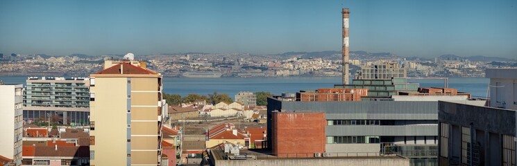 aerial panoramic image of the city of lisbon and the tagus river from the industrial area of ​​Barreiro-Portugal.