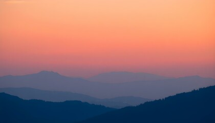 Serene Sunset over Layered Mountains, Peachy Sky