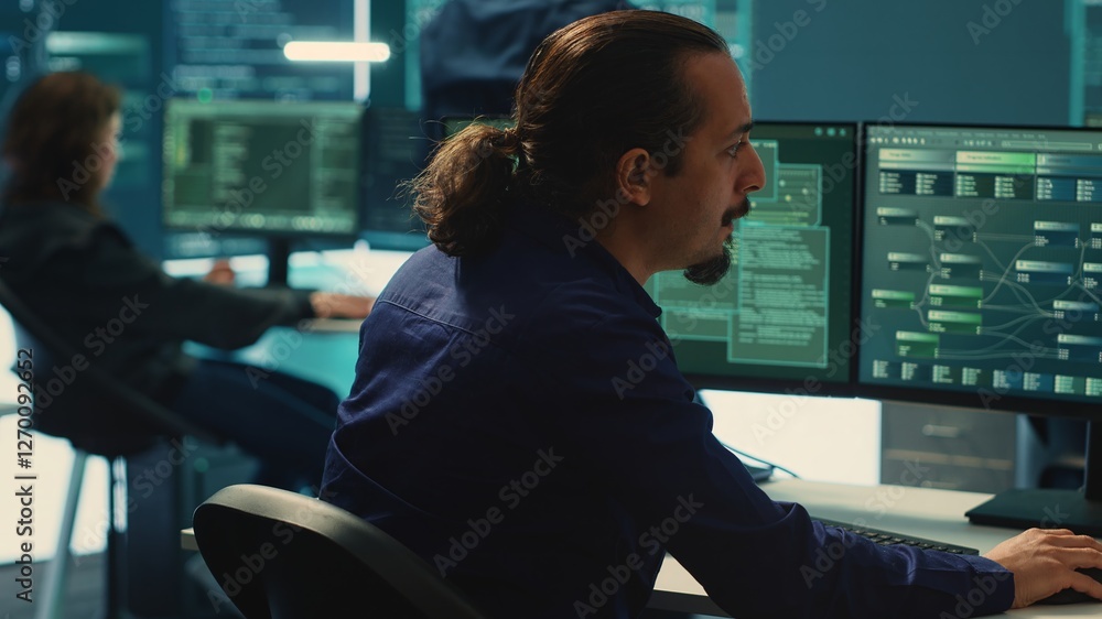 Poster cyber security experts in a governmental hacking room working on securing networks. hackers focusing