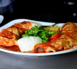Sliced Beyti Kebab with Yogurt and Cracked Wheat Rice