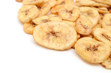 Banana chips on white background