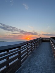 Obraz premium Miramar Beach Florida public beach access with sunset over the Gulf of Mexico 