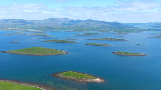 Aerial panorama of Clew Bay's archipelago of islands, partly drowned limestone drumlins formed by glacier. Aka Cuan Modha, one of nature's greatest spectacles when viewed from above. Co. Mayo, Ireland