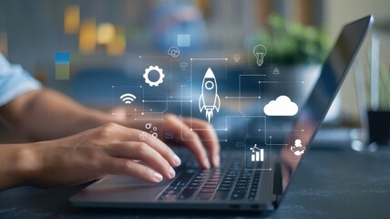 Person types on laptop with digital technology symbols overlayed