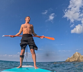 Relax on stand up paddle board