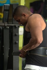 Fit Man Lifting Weights at the Gym – Strength Training Close-Up