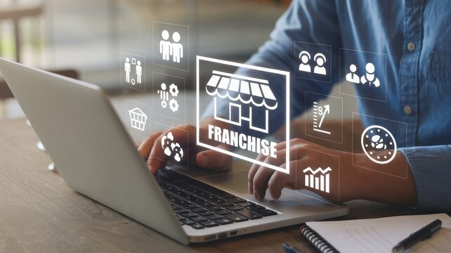 Person researching franchise opportunities on a laptop computer