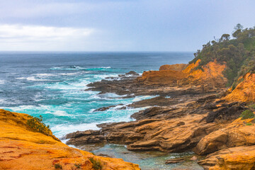 Overcast morning seascape with rocky headland at Bermagui
