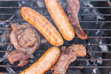 Backyard Barbecue with sizzling meat on a warm, sunny day
