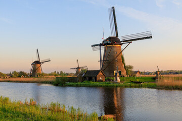 Naklejka premium Europe, The Netherlands, Holland. South Holland, Zuid Holland, Kinderdijk. Windmills.