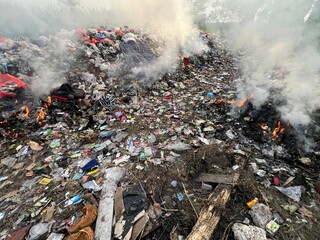 Landfill with Smoke from Burn
