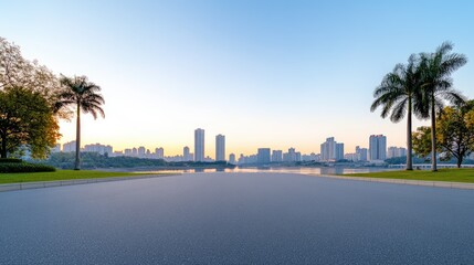 Serene Urban Landscape at Sunrise with Palm Trees and Reflective Water in the Background